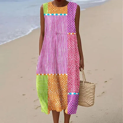 Vestido de mujer confeccionado en algodón y lino con estampado abstracto y bolsillos laterales.