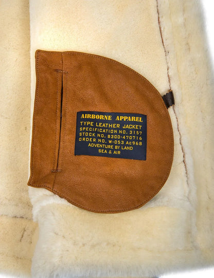 🔥Ofertas de Año Nuevo 2026 - Chaqueta de piel de oveja B-3 color whisky con capucha
