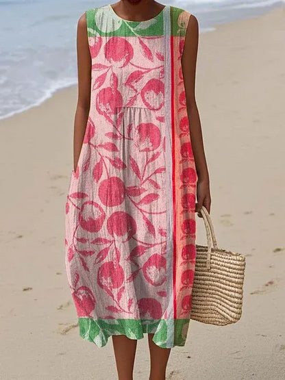 Vestido de mujer confeccionado en algodón y lino con estampado abstracto y bolsillos laterales.